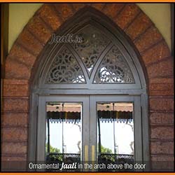 Ornamental Jaali in the arch above the door